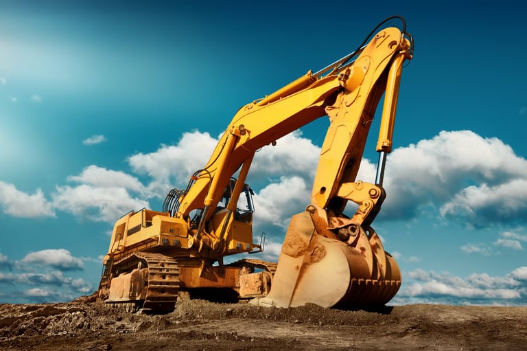 Large excavator on professional construction site with blue sky