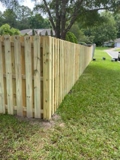 Professional fence installation on beautiful property